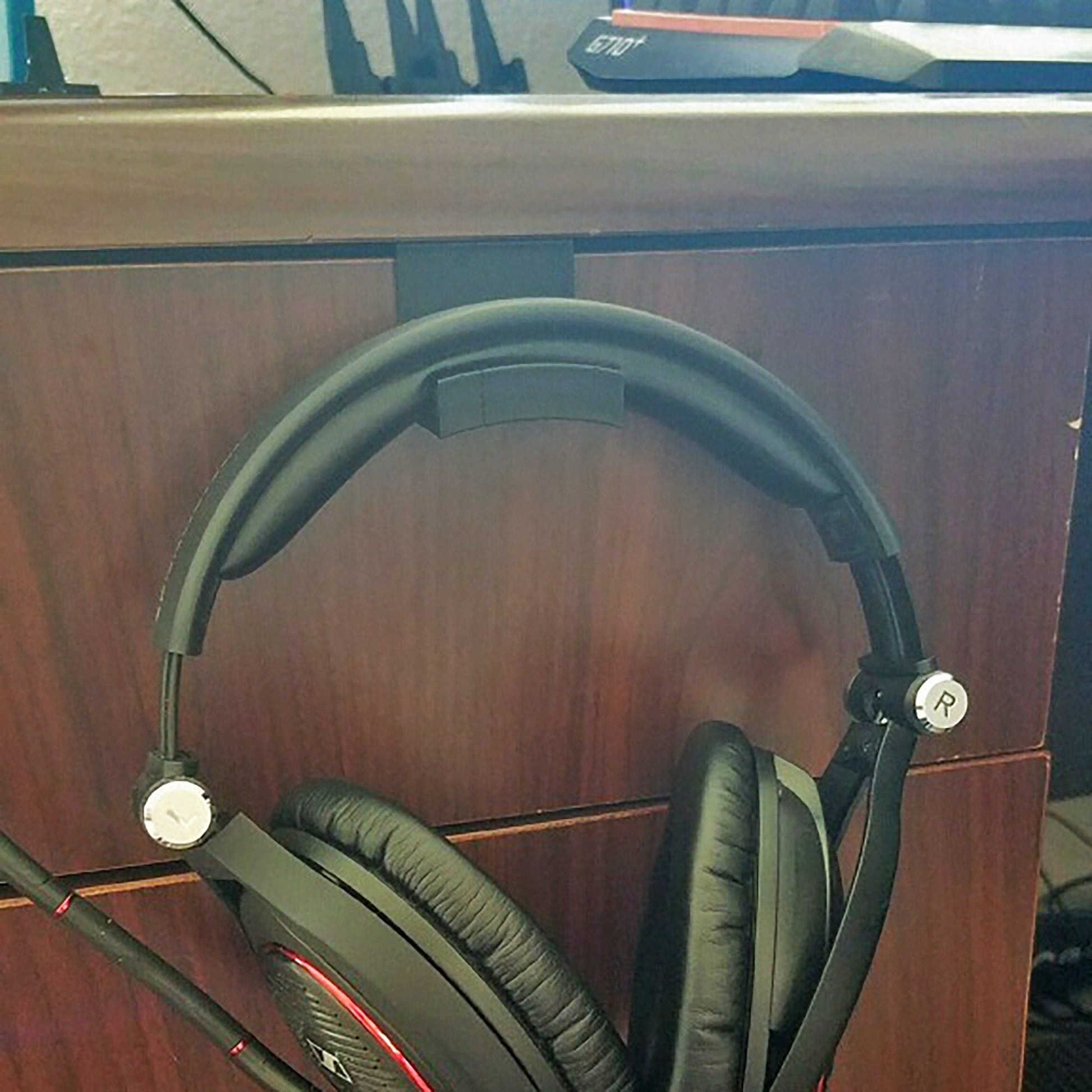 a pair of headphones sitting on top of a desk