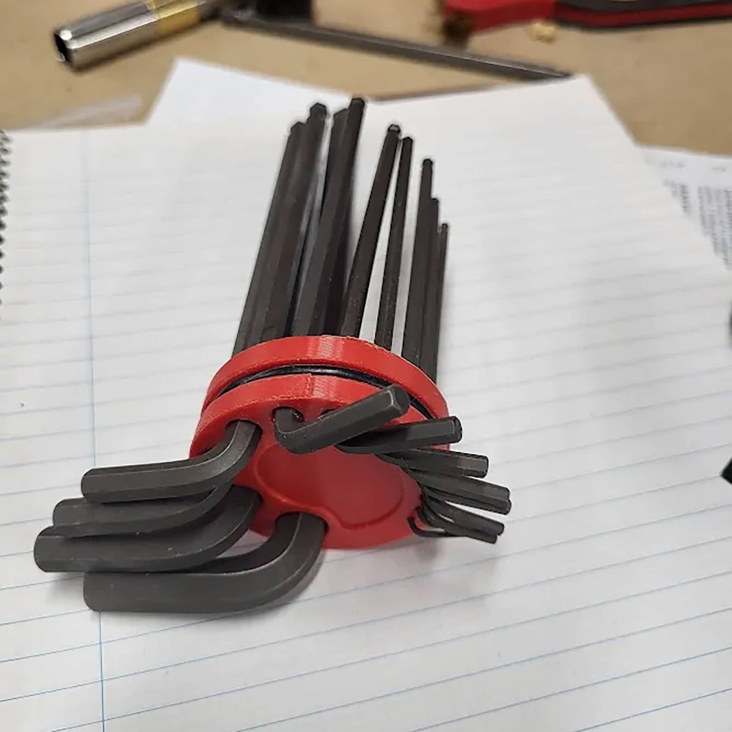 a bunch of tools are laying on top of a piece of paper