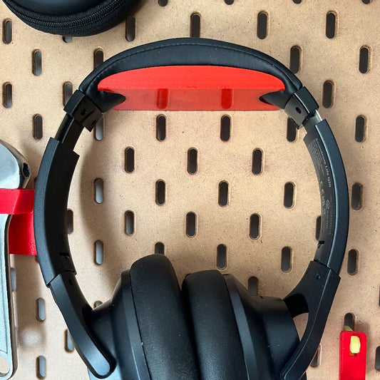 a pair of headphones sitting on top of a table