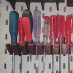 Screwdriver holder for IKEA SKADIS pegboard with angled slots holding drivers handle up, view 5