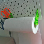 Paper towel holder for IKEA SKADIS pegboard with a kitchen roll on a rotating end cap, view 2
