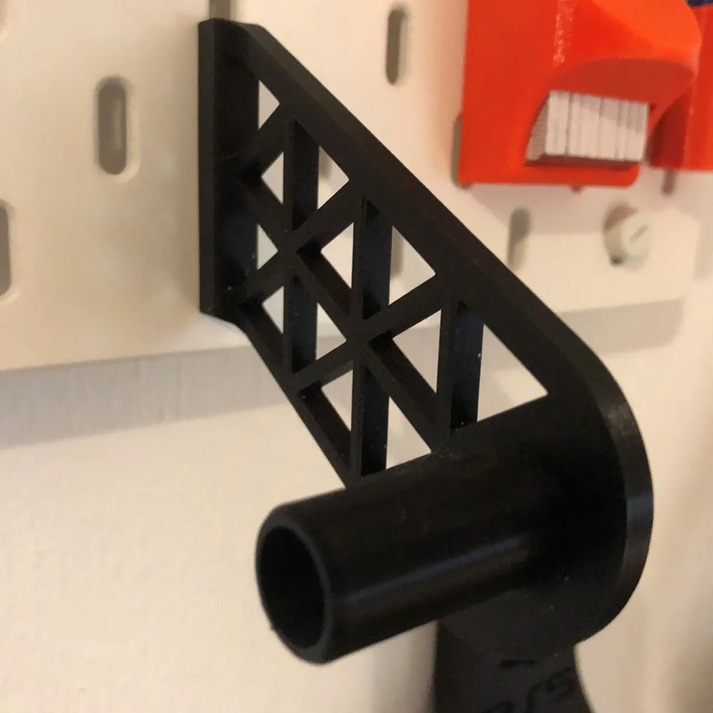 Paper towel holder for IKEA SKADIS pegboard with a kitchen roll on a rotating end cap, view 5