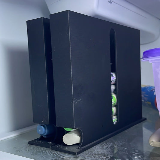 a couple of black boxes sitting on top of a counter