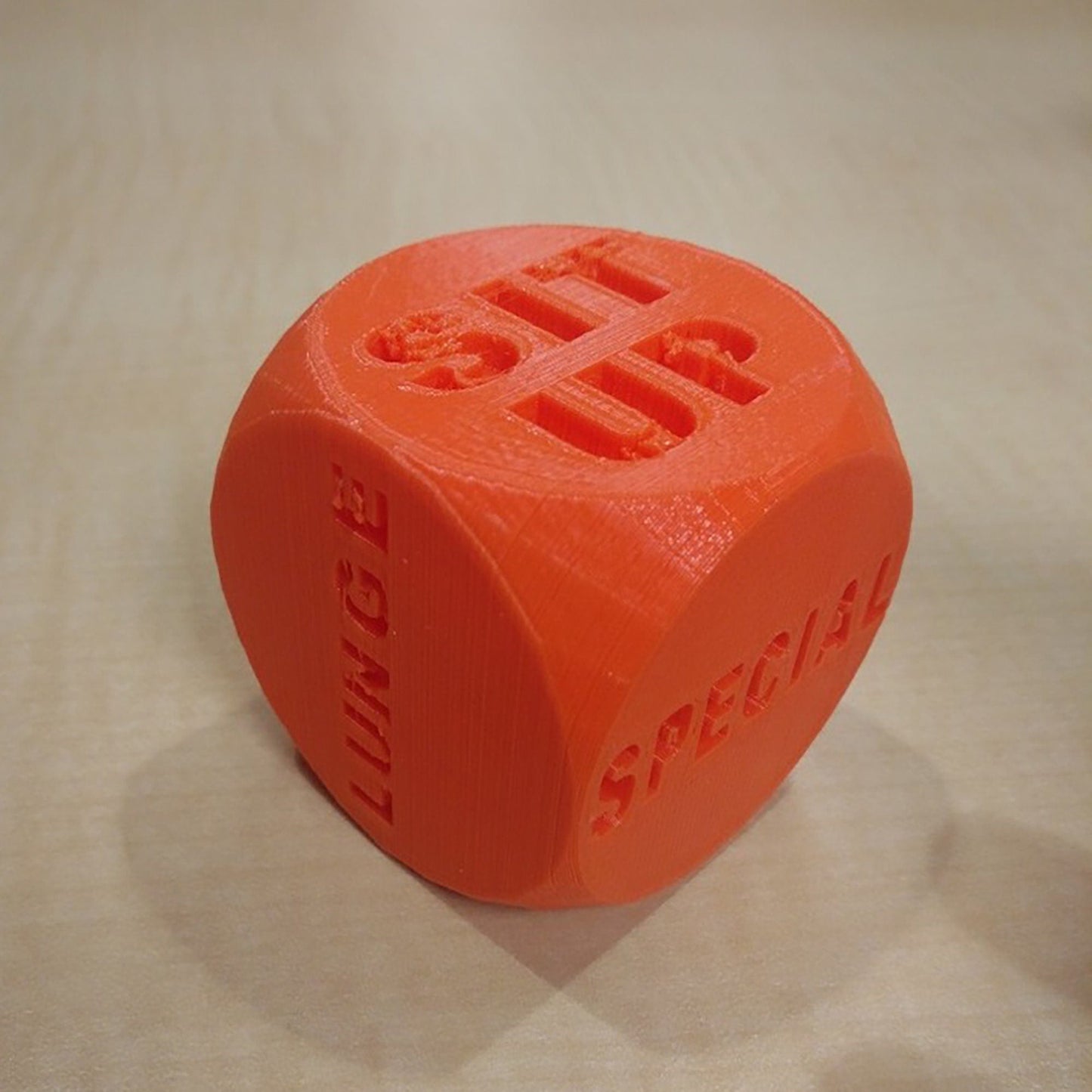 a close up of a dice on a table