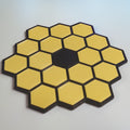 Hexagon honeycomb drink coaster modeled on the James Webb Space Telescope mirror