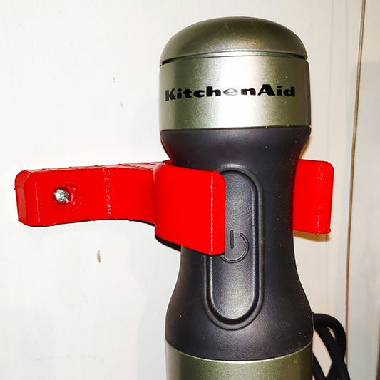 a kitchen aid blender sitting on top of a counter