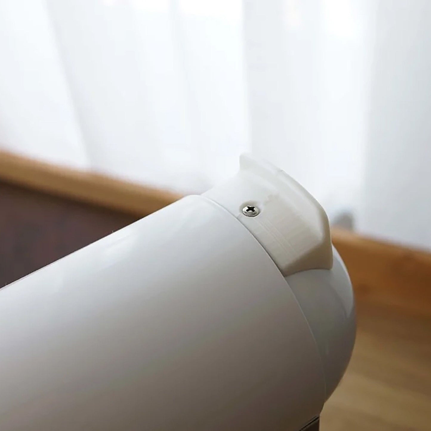 a close up of a hair dryer on a table