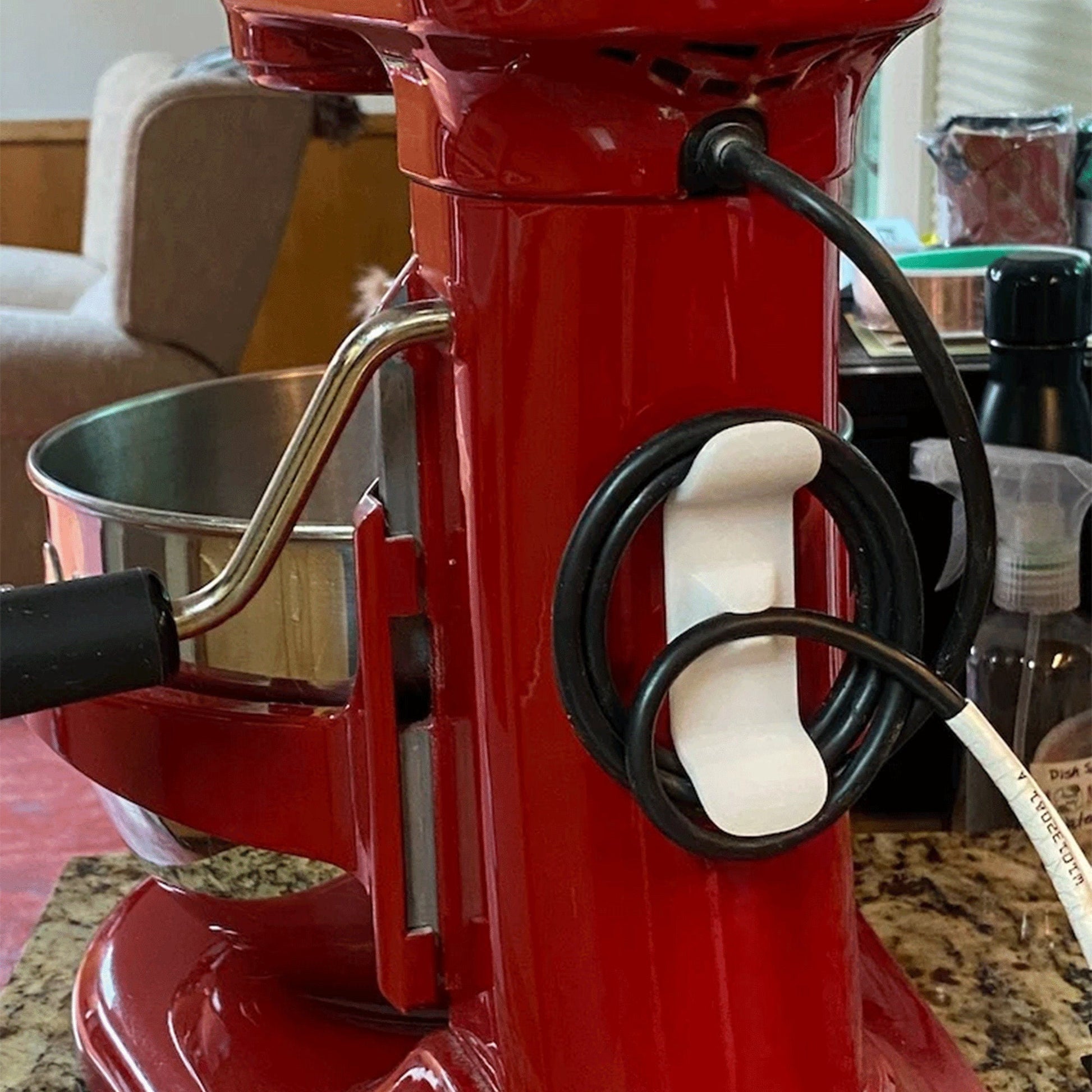 a red blender sitting on top of a counter