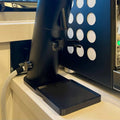 Low-profile cleanup tray under a Lagom P64 coffee grinder