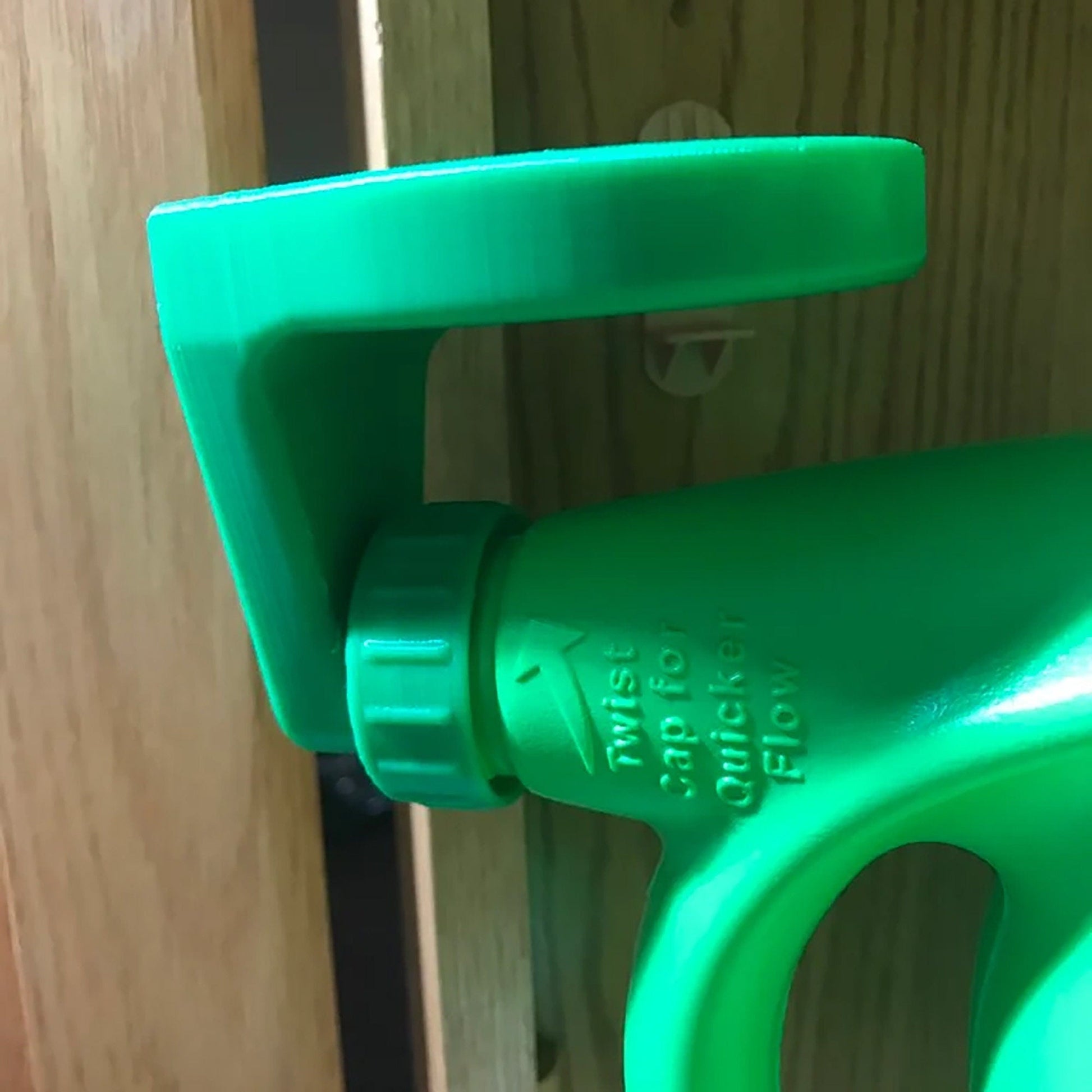 a close up of a green handle on a door