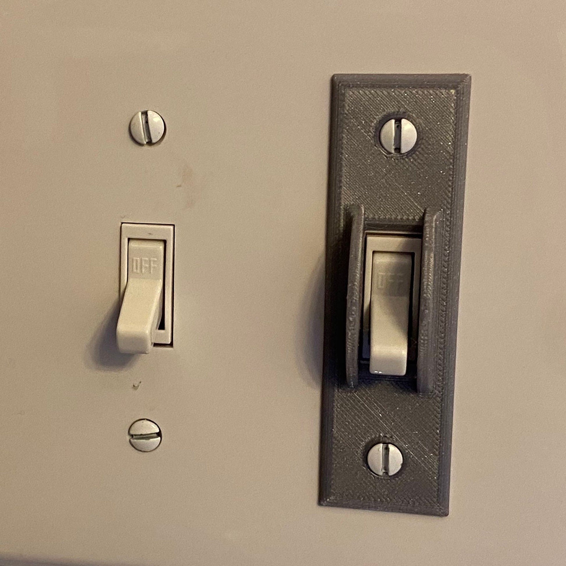 a close up of a light switch on a wall