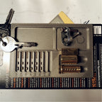 Lock pinning tray with numbered slots for pins, springs and plug parts, view 2