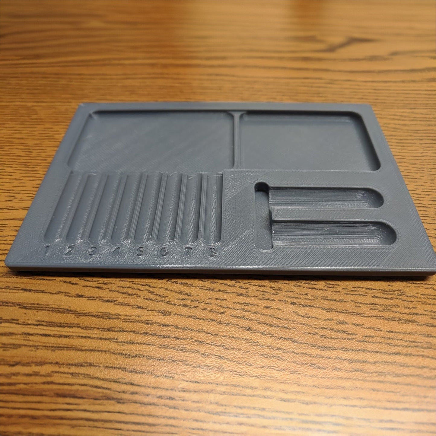 a plastic tray sitting on top of a wooden table