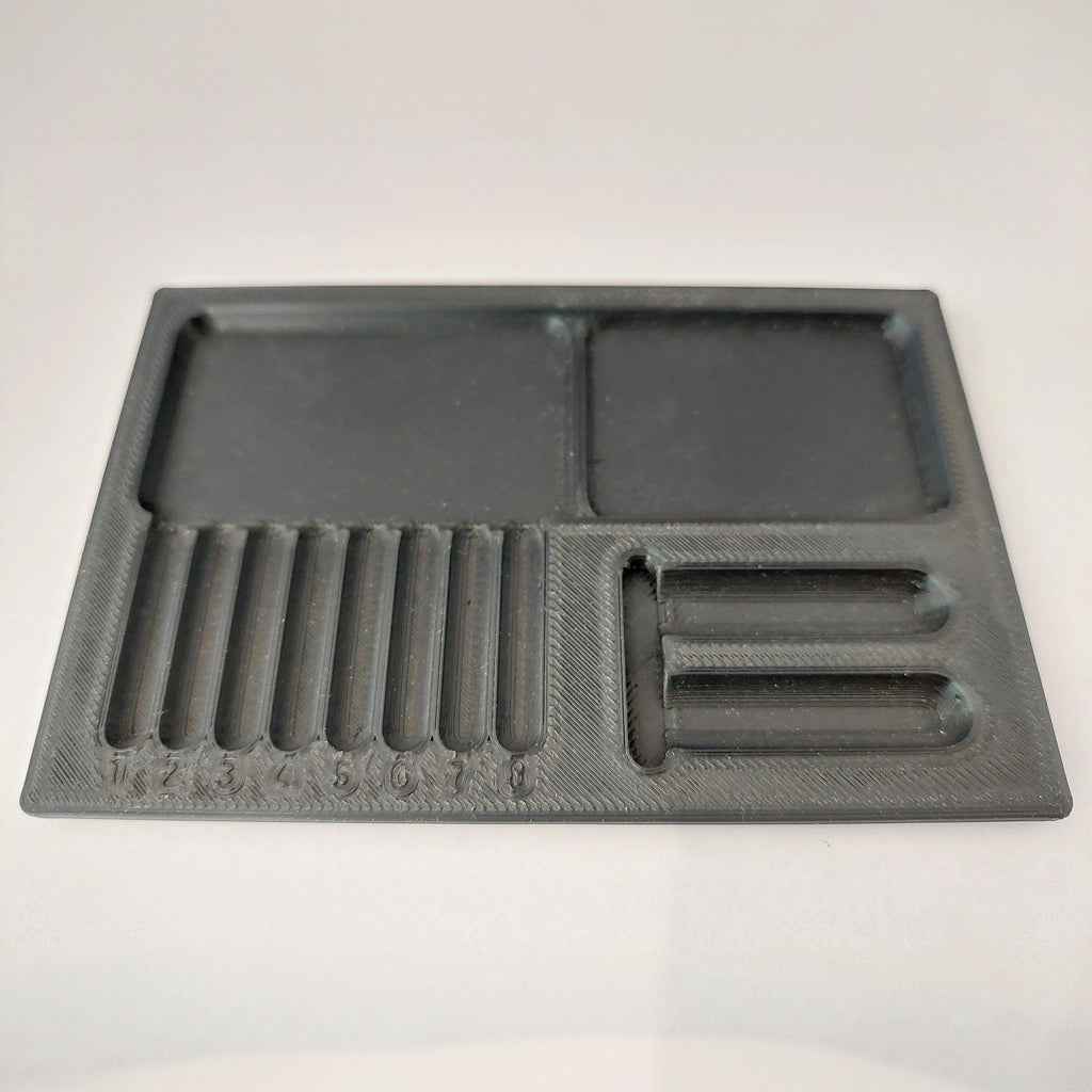 Lock pinning tray with numbered slots for pins, springs and plug parts, view 4