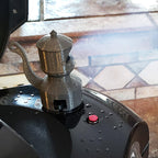 Train whistle shaped steam diverter on a Ninja Foodi pressure cooker lid, view 3