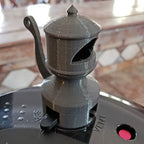 Train whistle shaped steam diverter on a Ninja Foodi pressure cooker lid