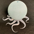 Octopus kraken stand with tentacle legs holding an Echo Dot 4th or 5th gen speaker, view 3