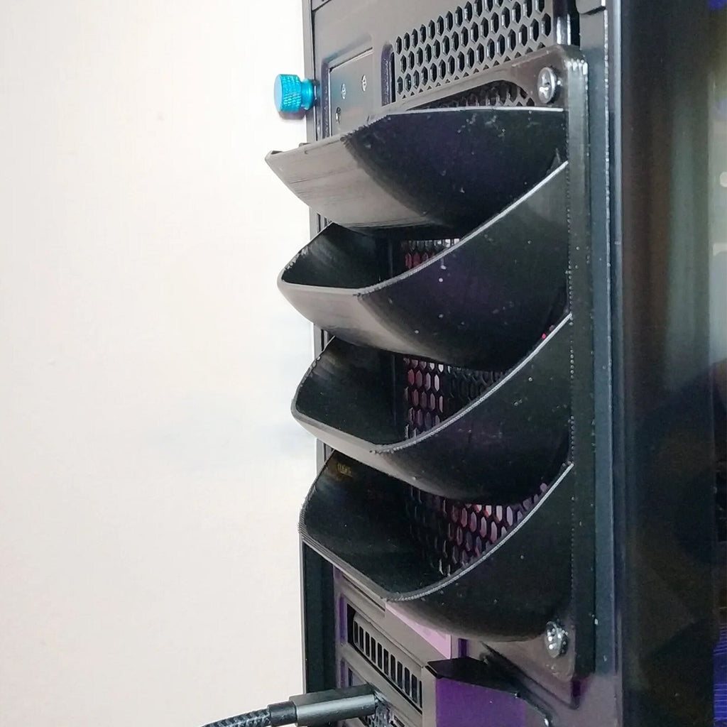Angled PC fan deflector mounted over a 120mm or 140mm case fan