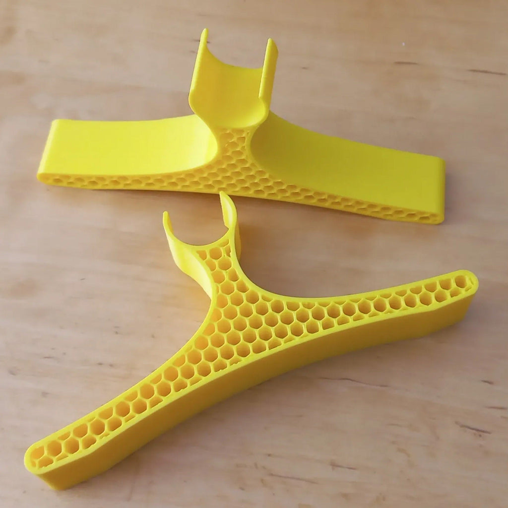 Pair of handlebar repair cradles supporting an upside-down mountain bike