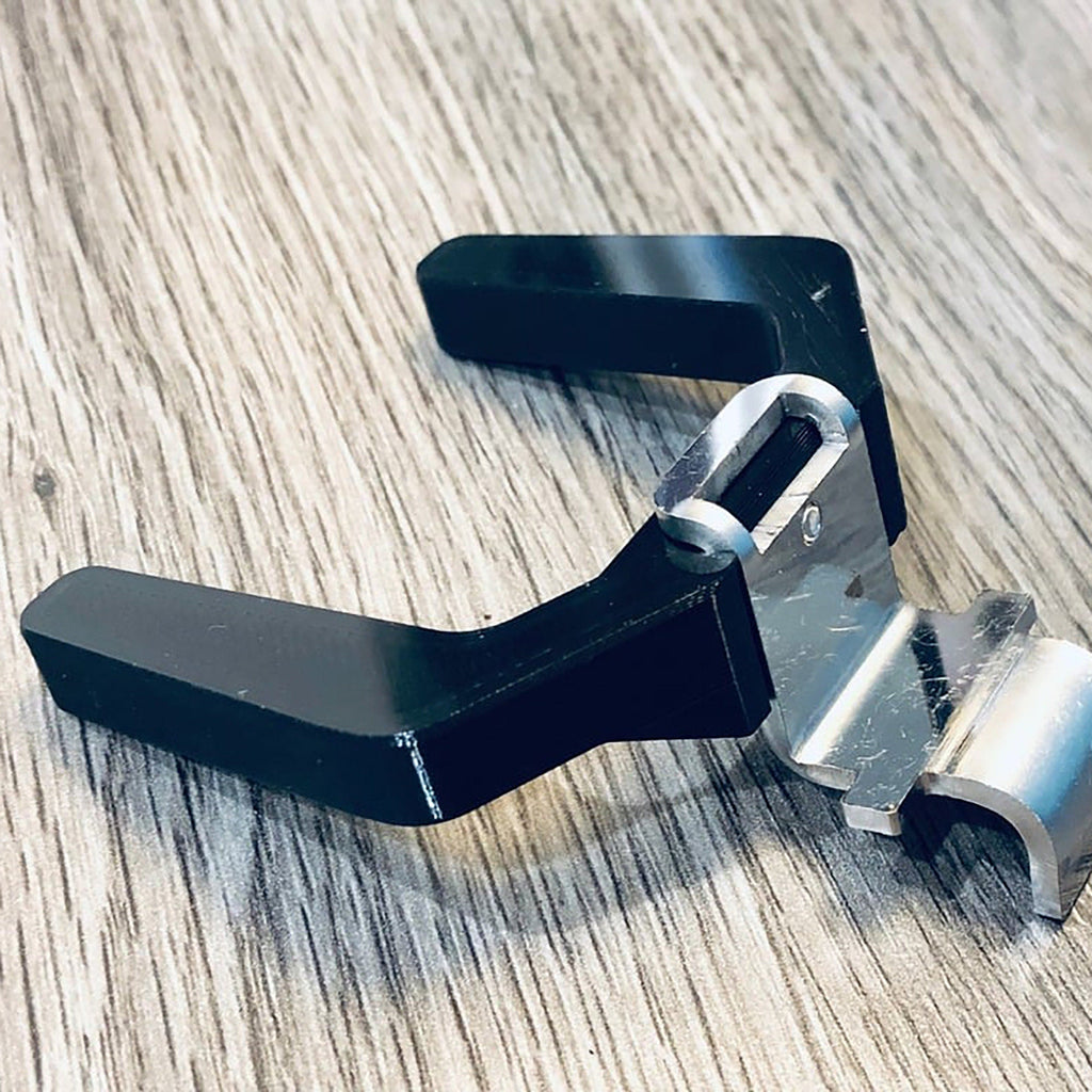 Fork-shaped portafilter holder on the front of a Eureka Mignon Specialita grinder, view 2