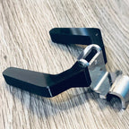 Fork-shaped portafilter holder on the front of a Eureka Mignon Specialita grinder, view 2