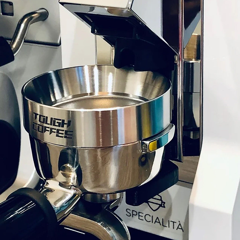 Fork-shaped portafilter holder on the front of a Eureka Mignon Specialita grinder, view 4