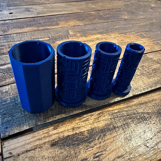 a group of blue vases sitting on top of a wooden table