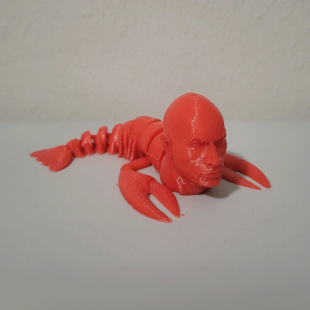 Articulated lobster fidget toy with flexible segmented tail and pivoting claws