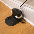 Charging cord wrap behind a Roomba base station