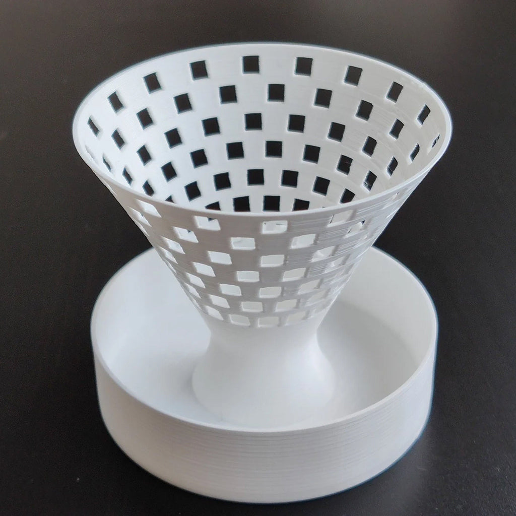 Self-watering seedling planter cone on a water reservoir base, view 4