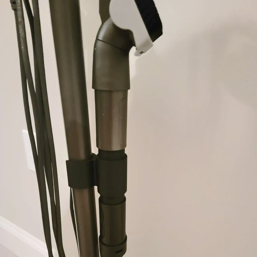 Wand clip holding two attachments on a Shark Rocket stick vacuum, view 2