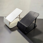 Angled sneaker storage rack stacking a pair of shoes one above the other, view 2