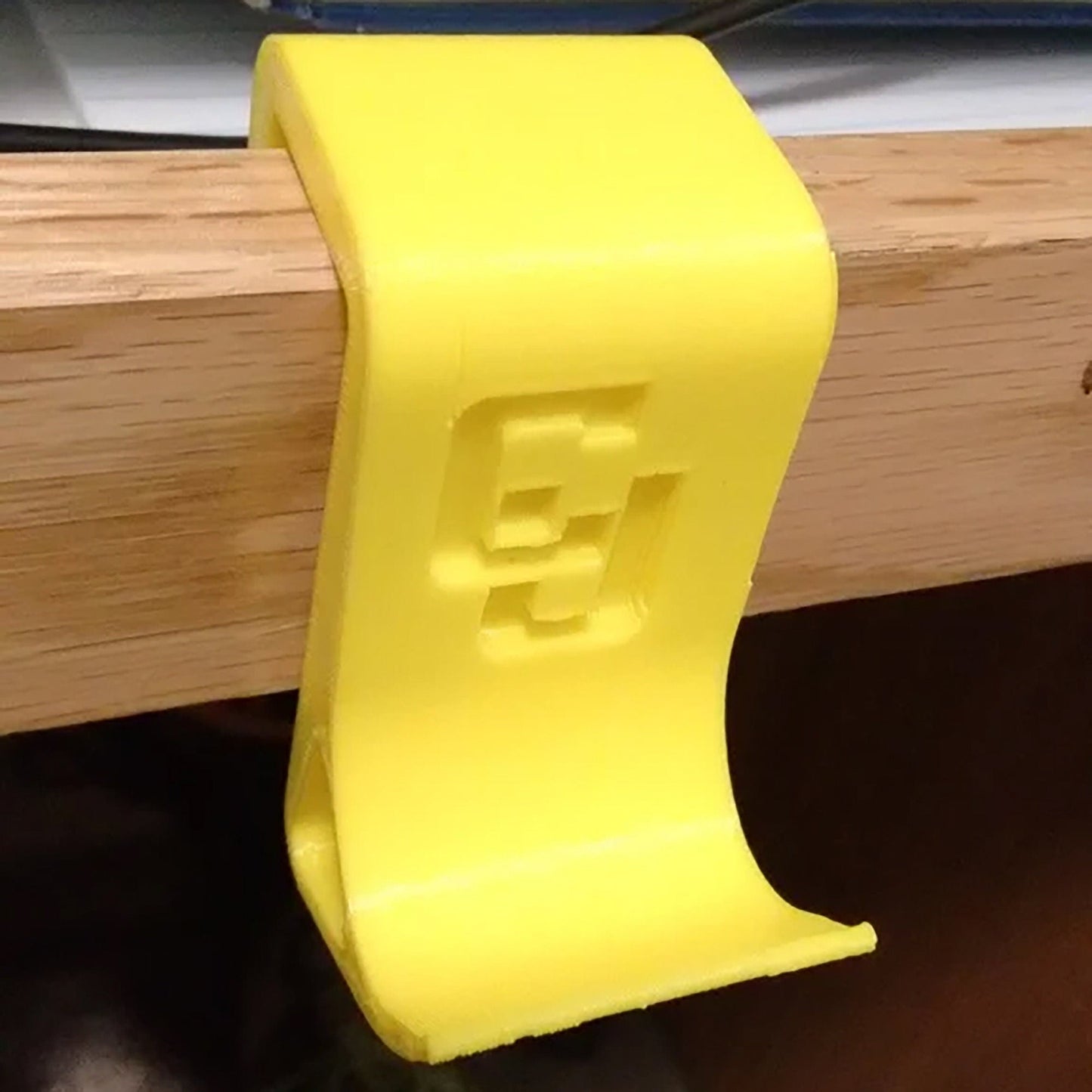 a close up of a yellow object on a table