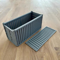 a container sitting on top of a wooden floor