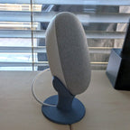 Angled pedestal stand for Google Nest Mini smart speaker, view 2