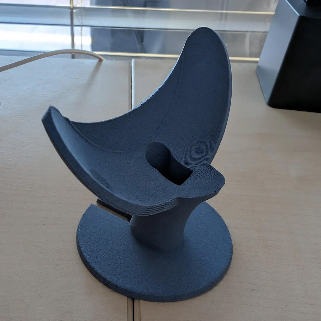 Angled pedestal stand for Google Nest Mini smart speaker, view 3