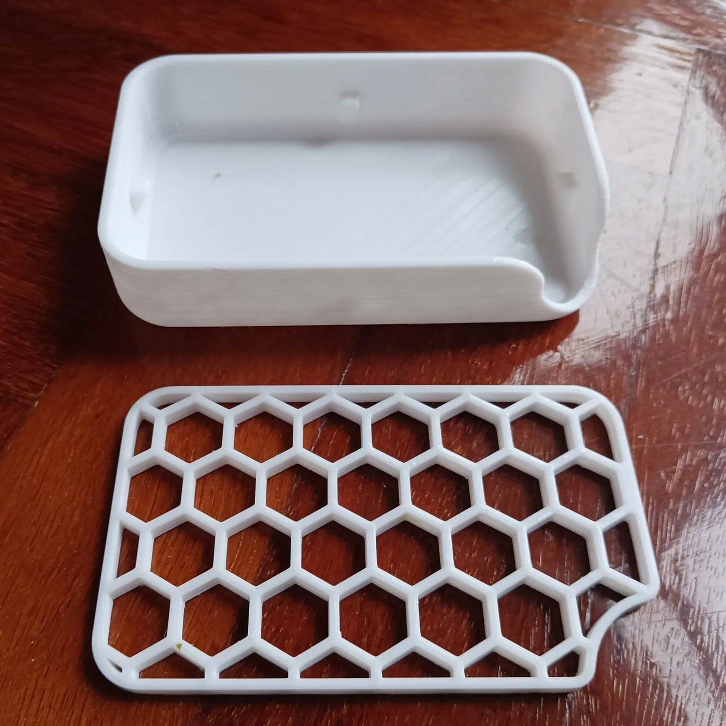 a plastic tray with a tray on top of it