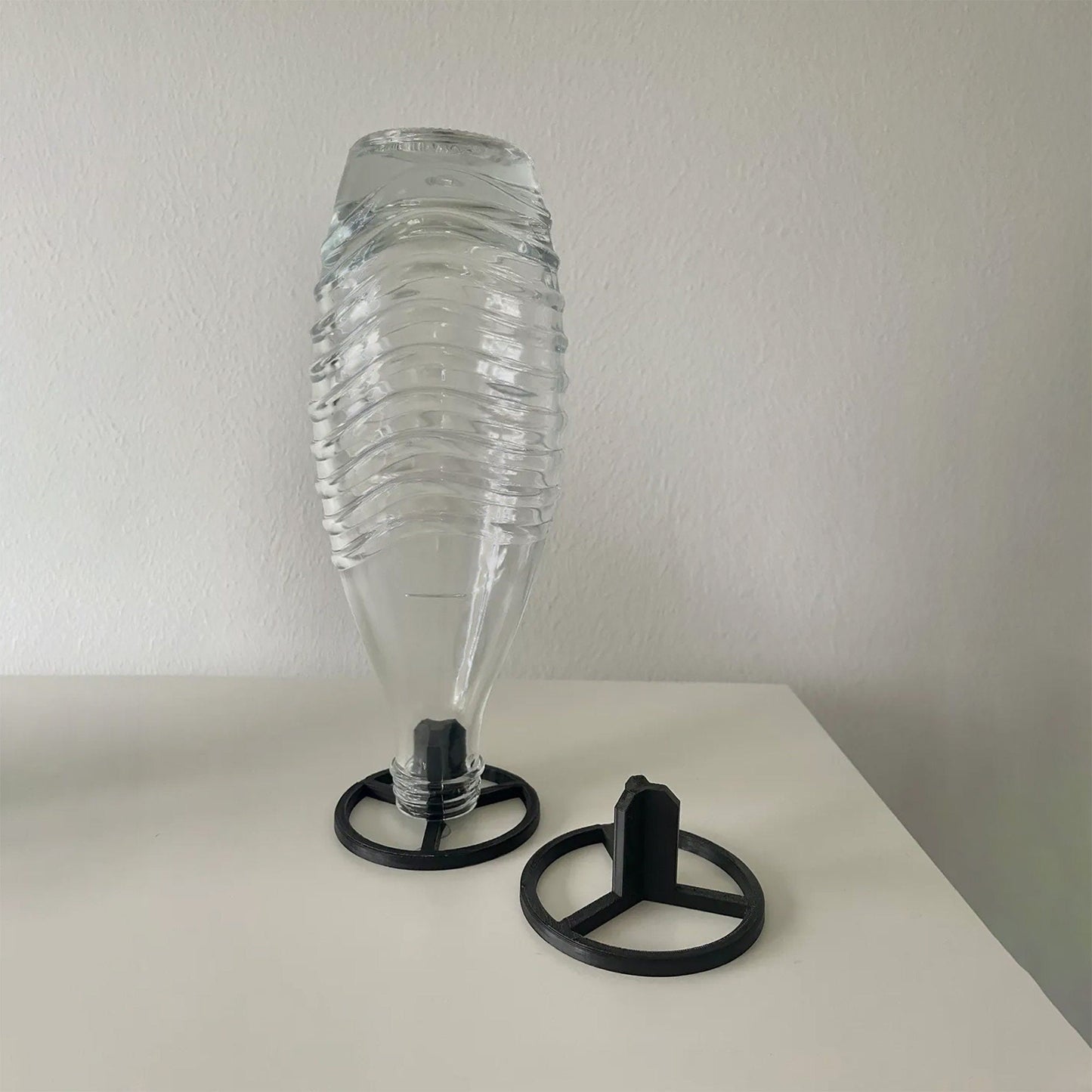 a plastic water bottle sitting on top of a table