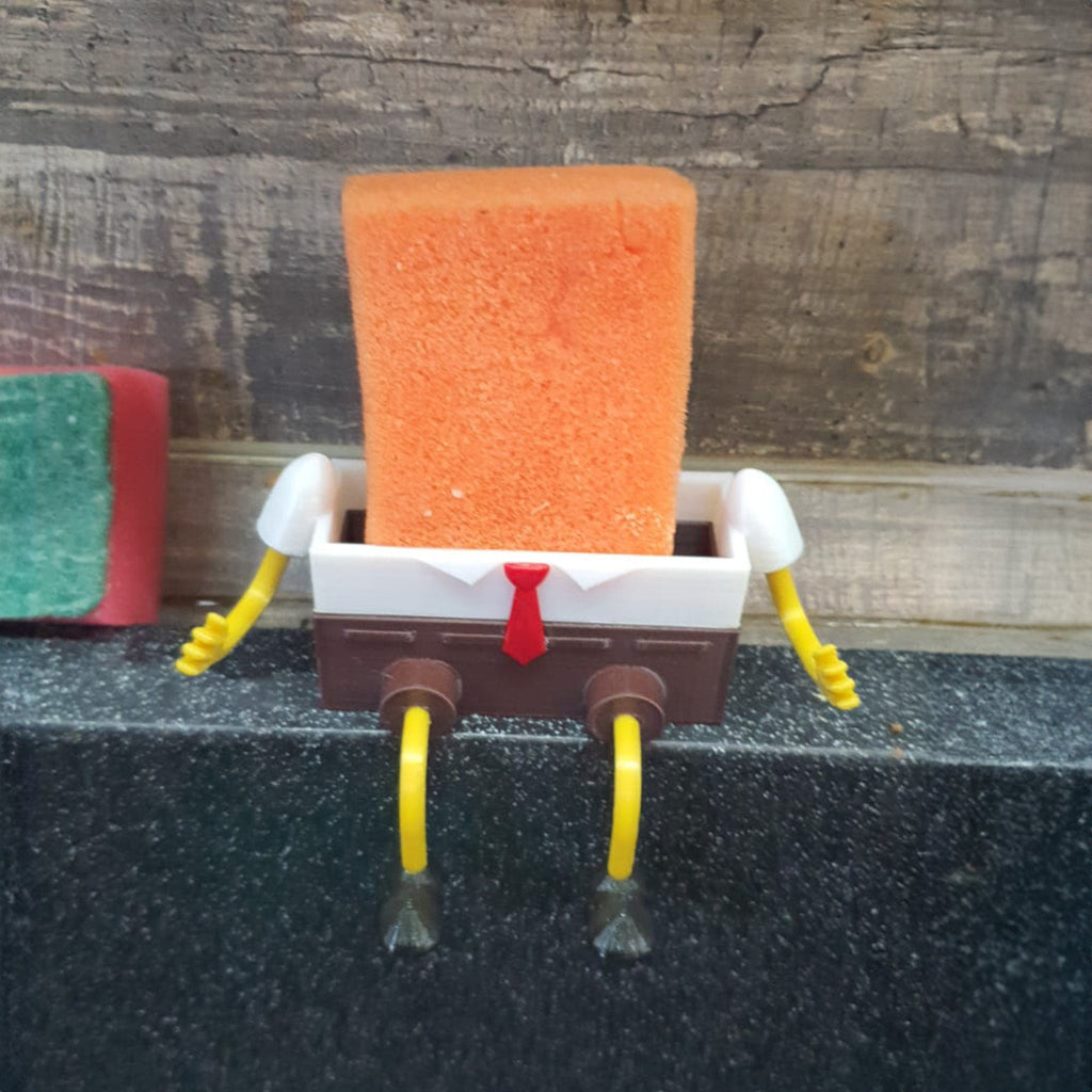 Kitchen sponge holder for SpongeBob fans with a dish sponge forming the figure's torso, view 2