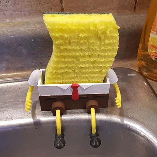 a spongebob in a sink with a red tie