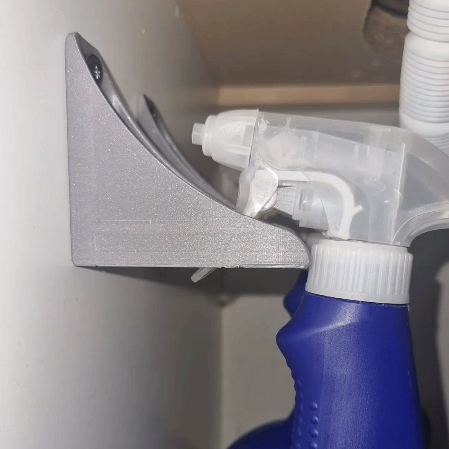 a close up of a bottle of cleaner on a shelf