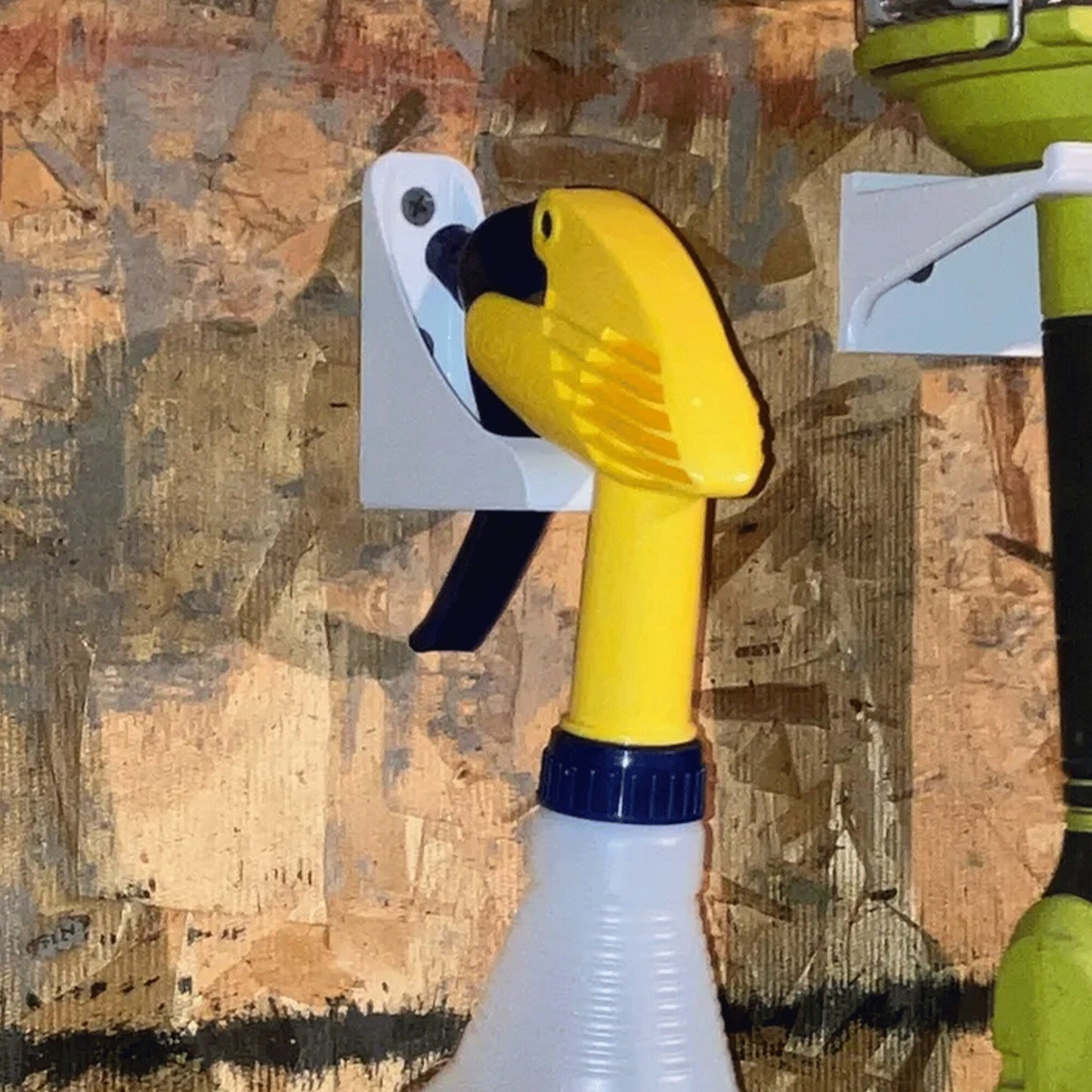 a close up of a yellow and white object on a wall