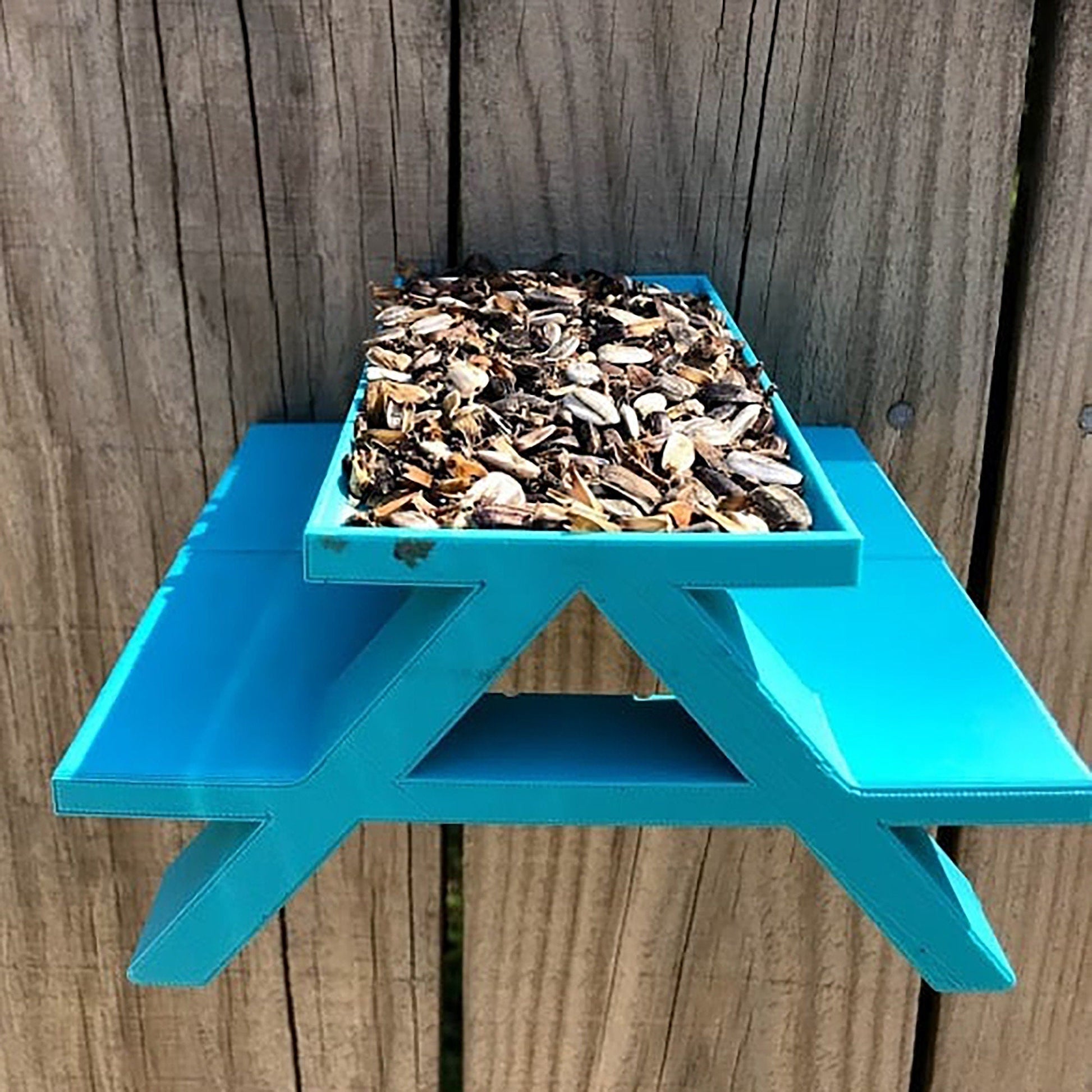 a blue table with a bunch of mushrooms in it