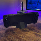 Low desk stand holding a Steam Deck handheld console upright at an angle, view 2