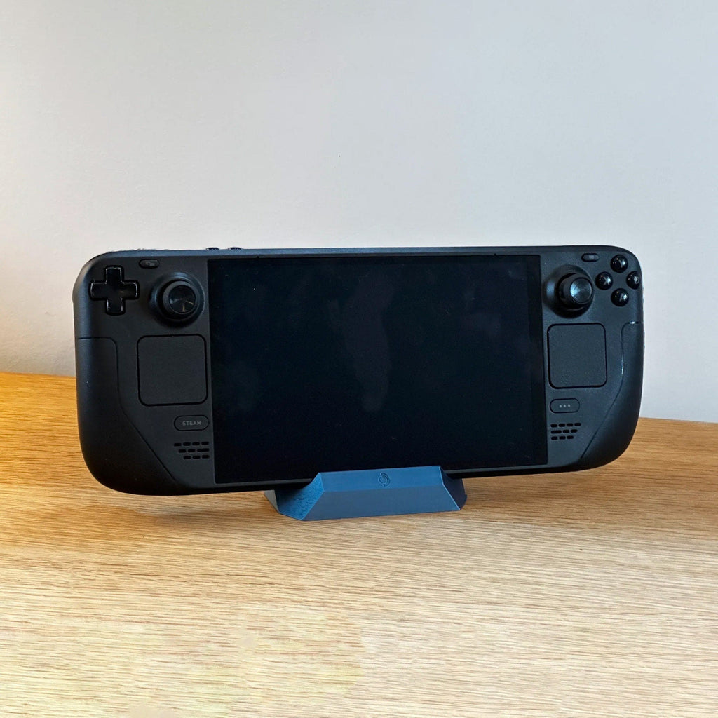 Low desk stand holding a Steam Deck handheld console upright at an angle, view 6