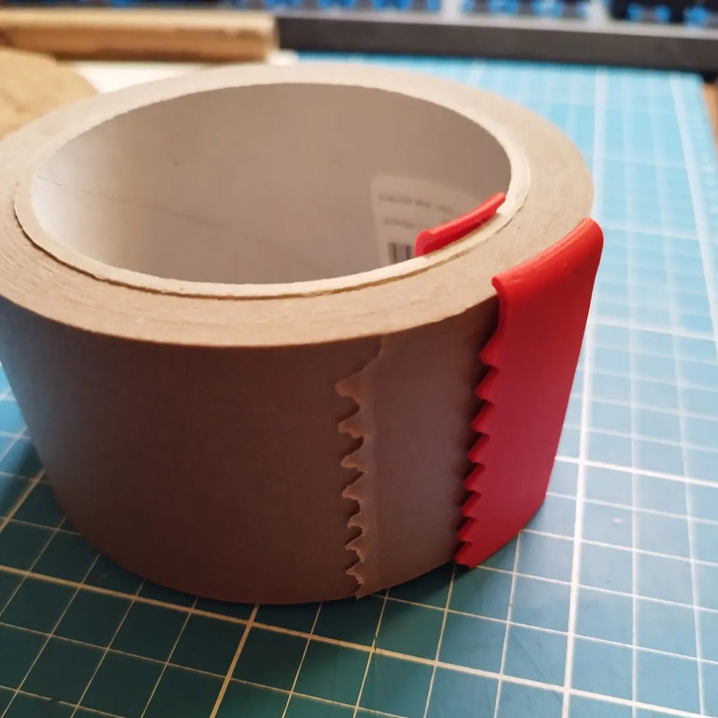 Clip-on serrated tape cutter for paper packing and masking tape rolls, view 3