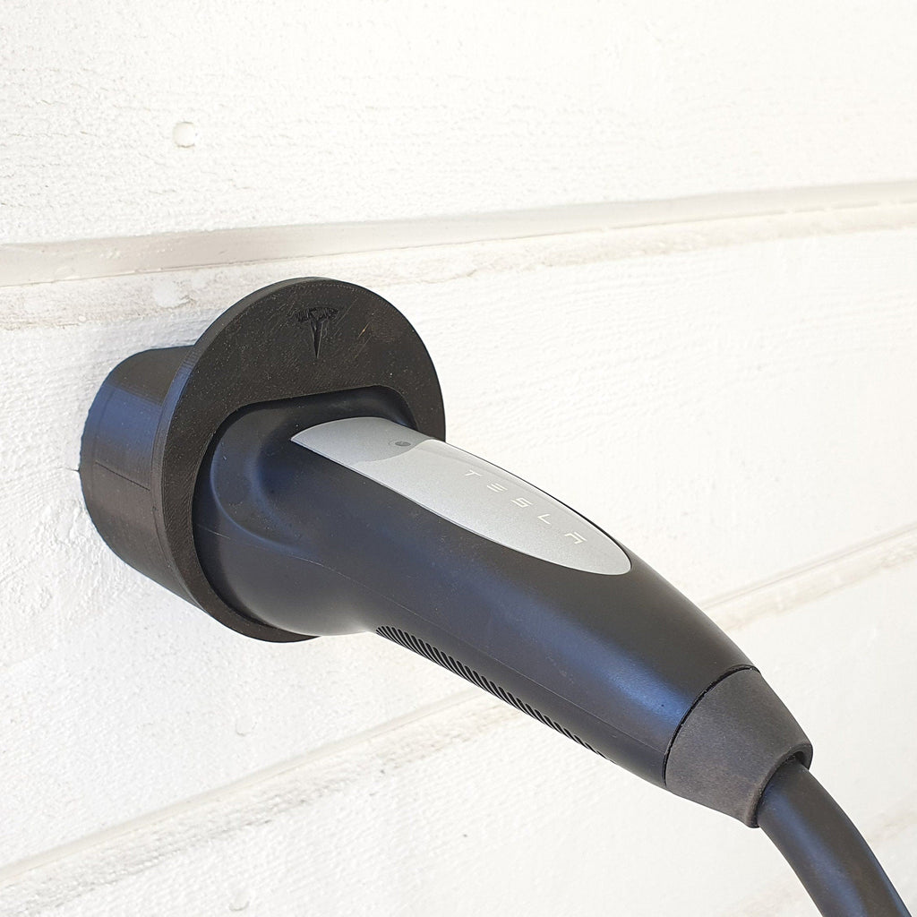 Wall mounted Type 2 EV plug holder with the charging cable looped over the top, view 2
