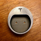 Wall mounted Type 2 EV plug holder with the charging cable looped over the top, view 4