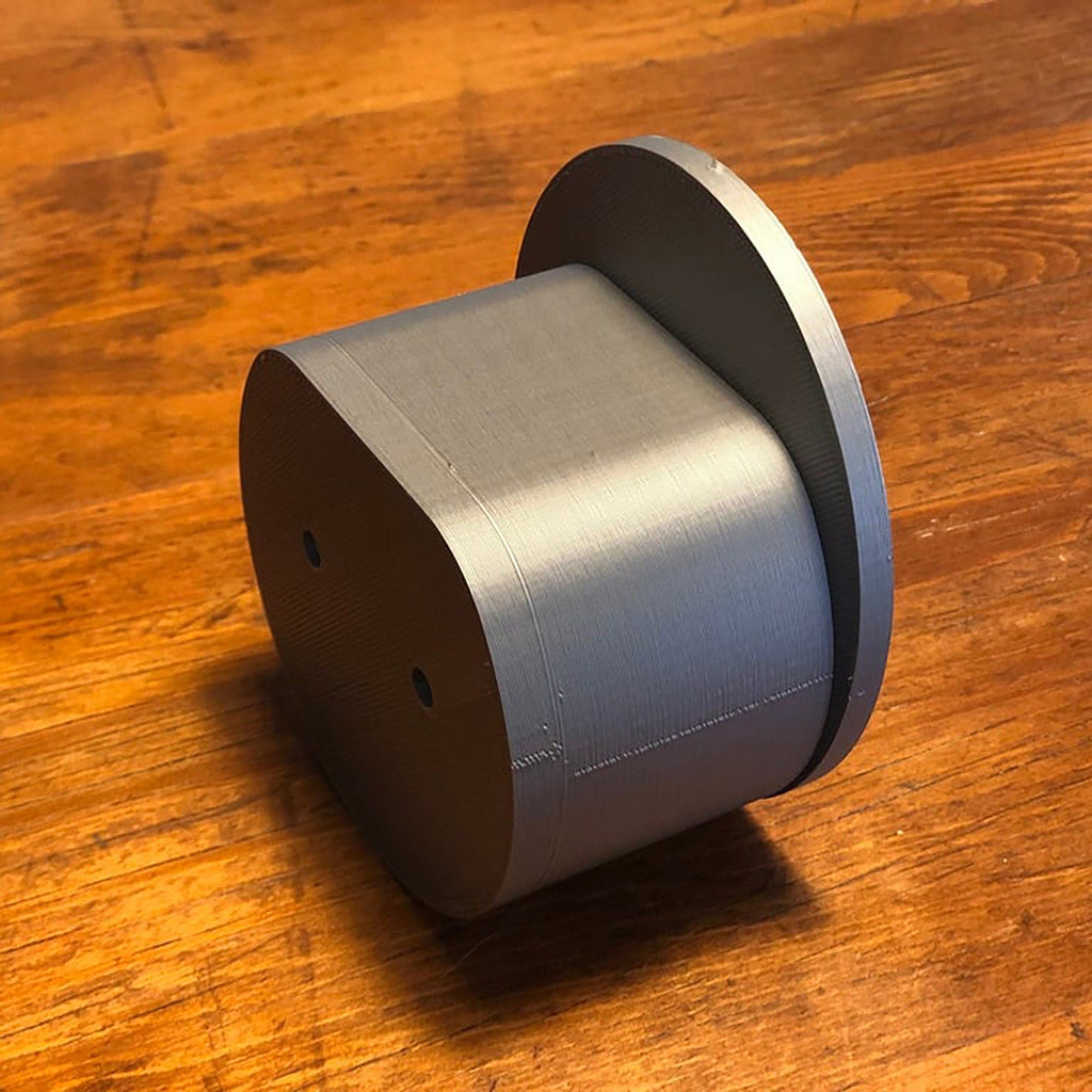 Wall mounted Type 2 EV plug holder with the charging cable looped over the top, view 5