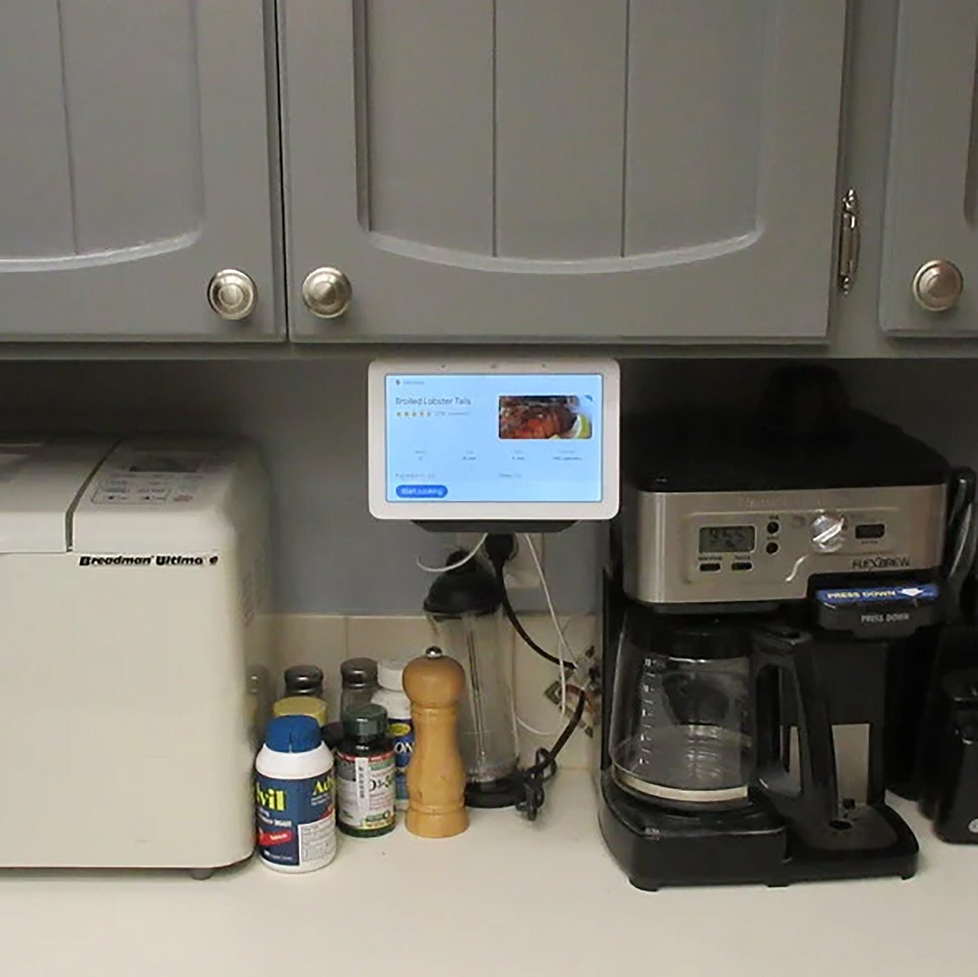 a coffee maker sitting on top of a kitchen counter